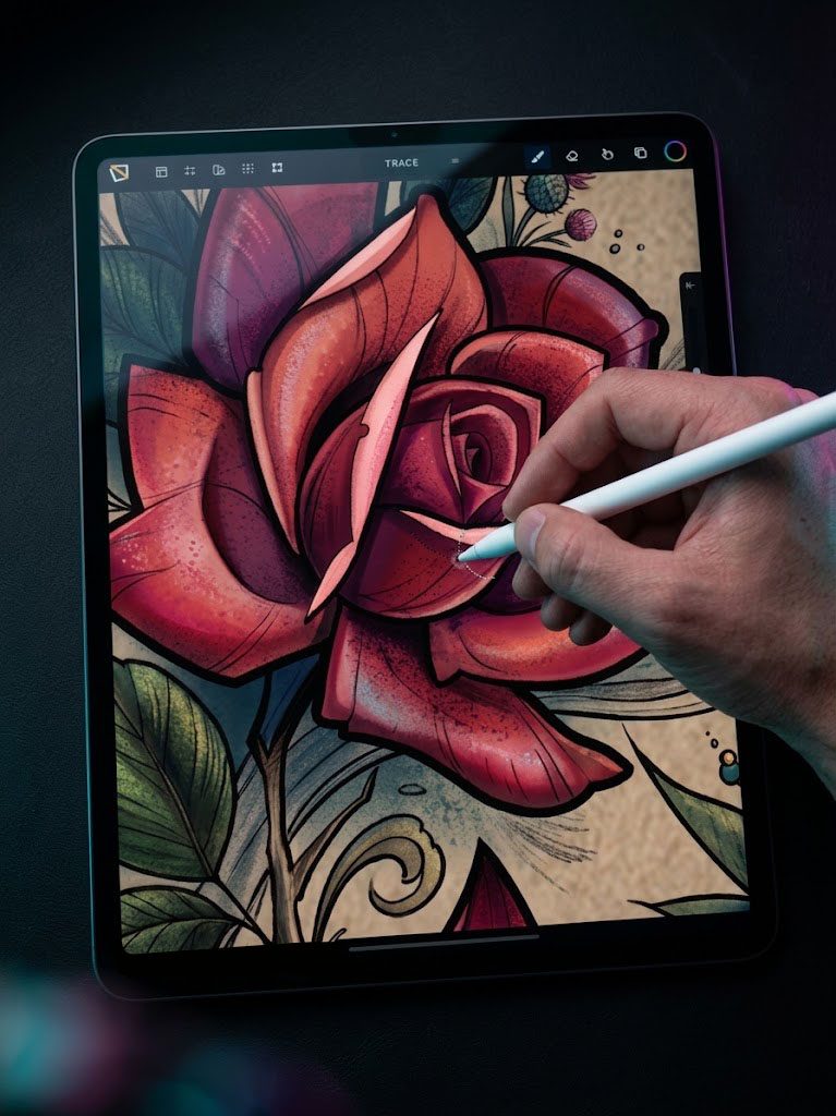 A tattoo artist using the TatToolkit app